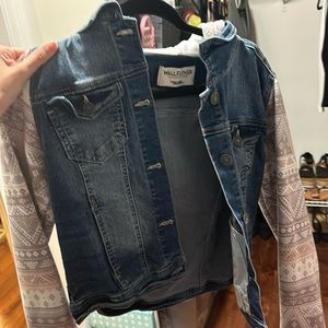 Jean jacket with designs on sleeves and hood
